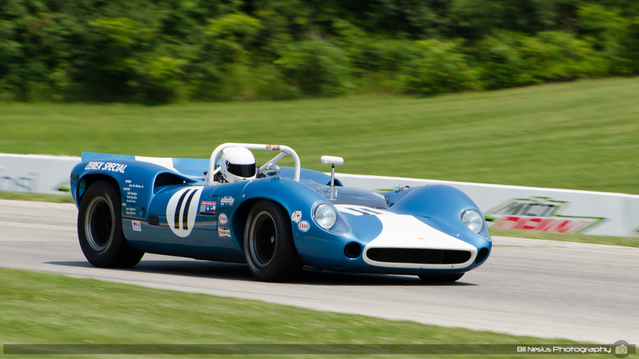 1965 Lol#2a T70 MkI #11 driven by Marc Devis. Road America, Elkhart Lake, WI. Turn 7 / DSC_0871
