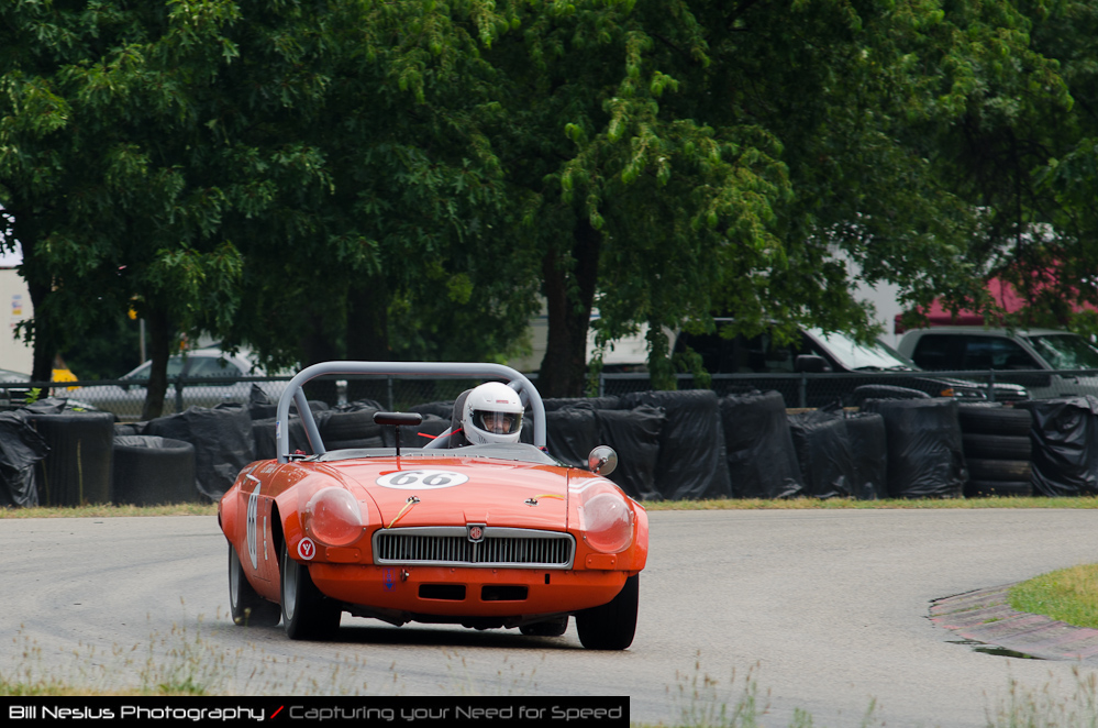 DSC_6413 / 1966 MG B car No 66, driven by Bishop Bullock in turn 4. Blackhawk Farms Raceway