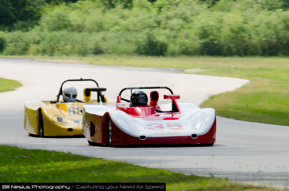 DSC_7632 / 1986 Lola T86/90 S2 driven by Jeffrey Porasik in turn 2-3. Blackhawk Farms Raceway