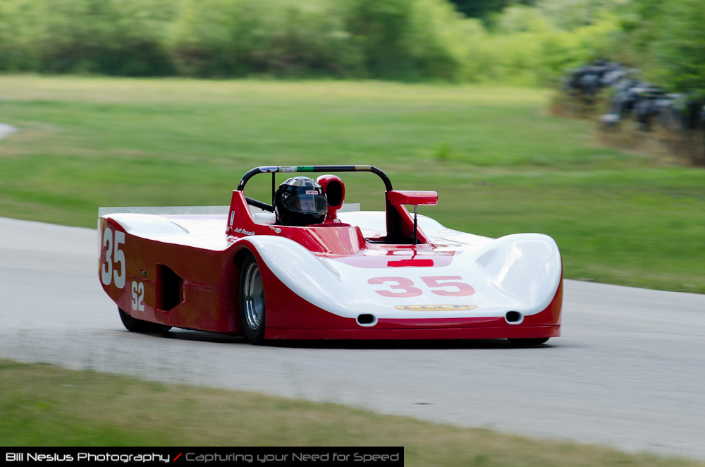 DSC_7641 / 1986 Lola T86/90 S2 driven by Jeffrey Porasik in turn 2-3. Blackhawk Farms Raceway