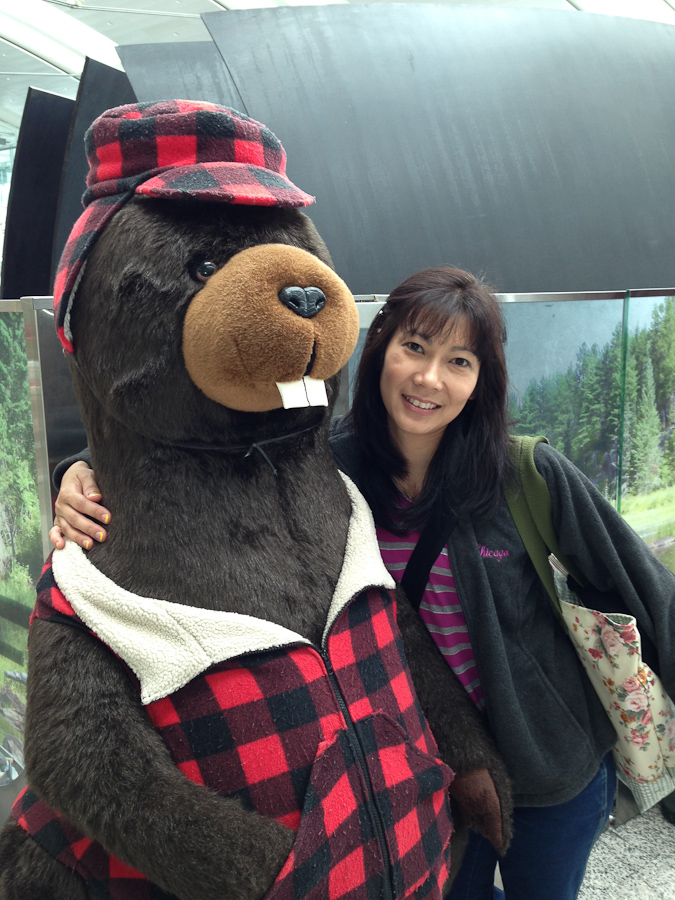iPhone pic - Sutaya making friends in the airport in Canada. / IMG_0852